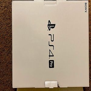White ps4 pro with controller and headphones